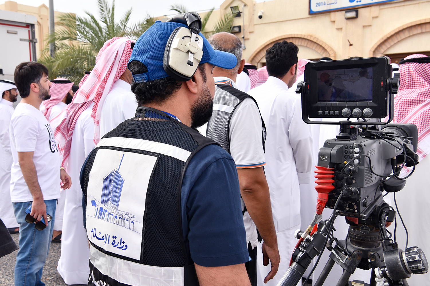 Journalists covering Kuwaiti elections with their smartphones	