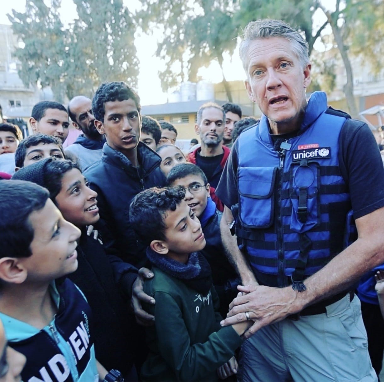 United Nations Children's Fund (UNICEF) Spokesperson James Elder with children in Gaza