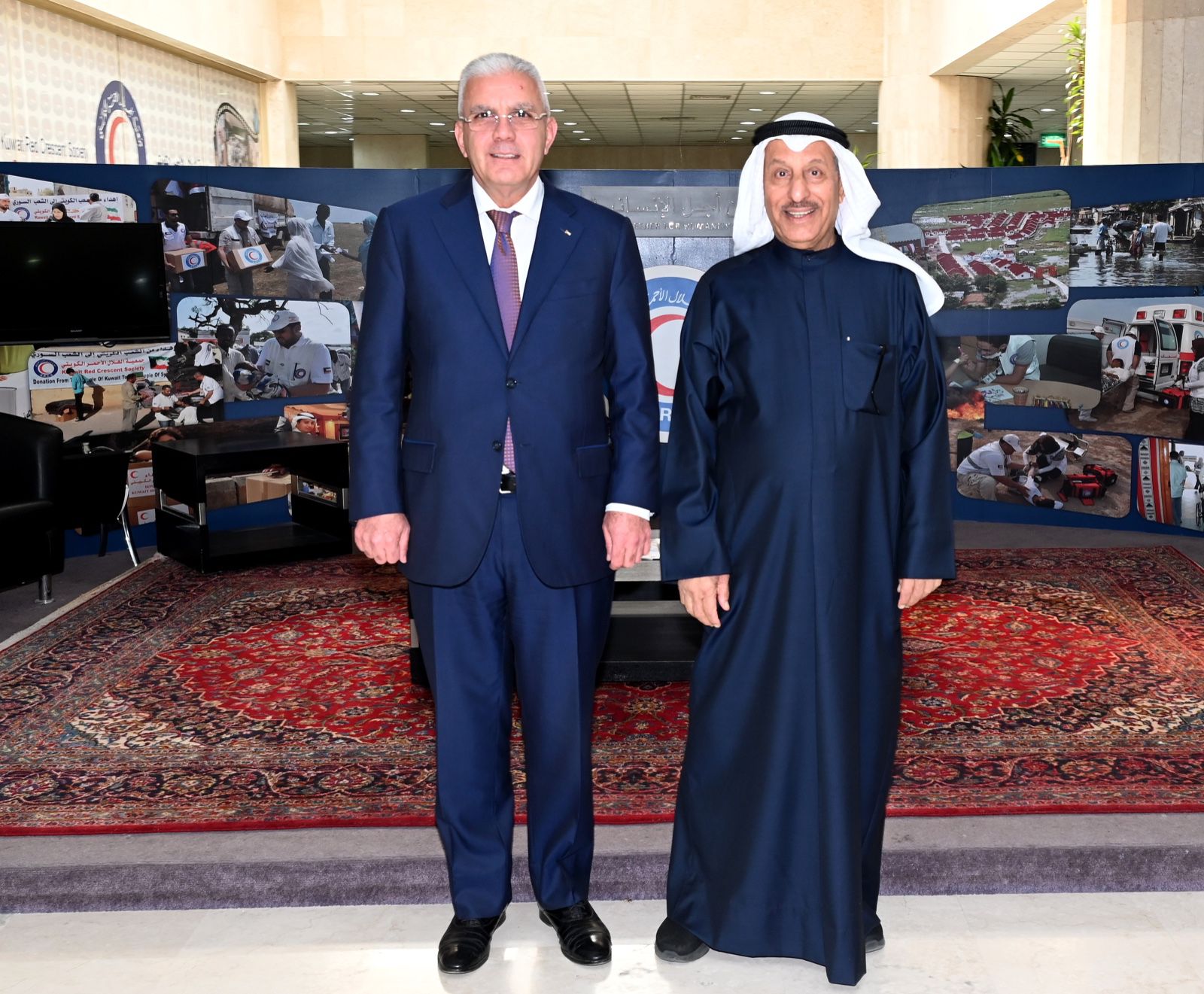 Chairperson of Kuwait Red Crescent Society Ambassador Khaled Al-Maghames with Palestinian ambassador to Kuwait