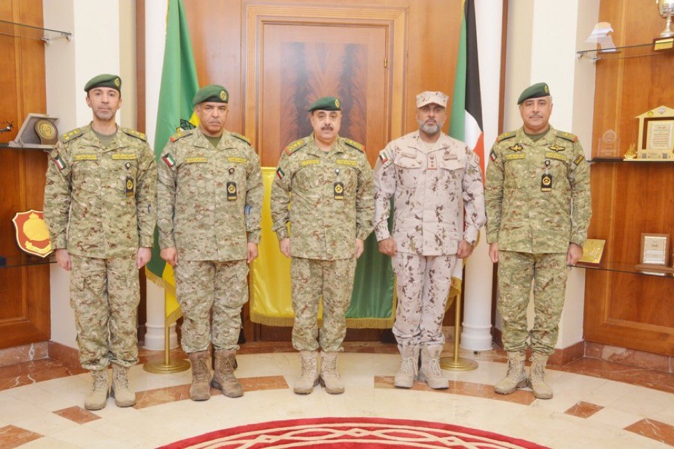 Undersecretary of Kuwait National Guard Lieutenant General Eng. Hashem Al-Rifai with UAE's Military Attachأ© to Kuwait Colonel Mohammad Al-Muhairi