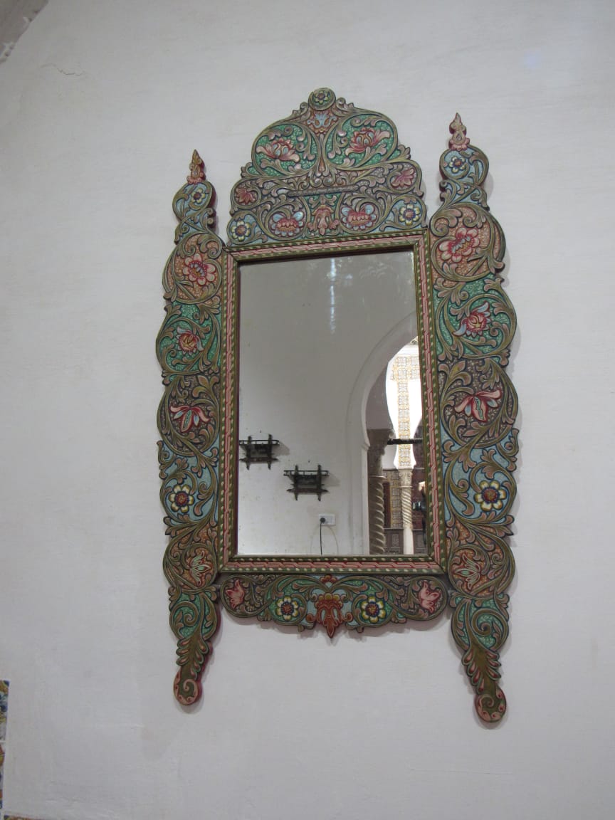 A mirror in one of the Palace's rooms