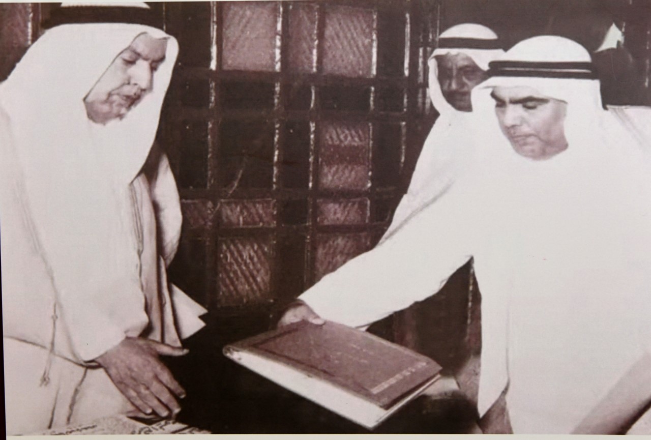 Speaker of the Constituent Assembly hands over the Constitution to late Amir Sheikh Abdullah Al-Salem Al-Sabah