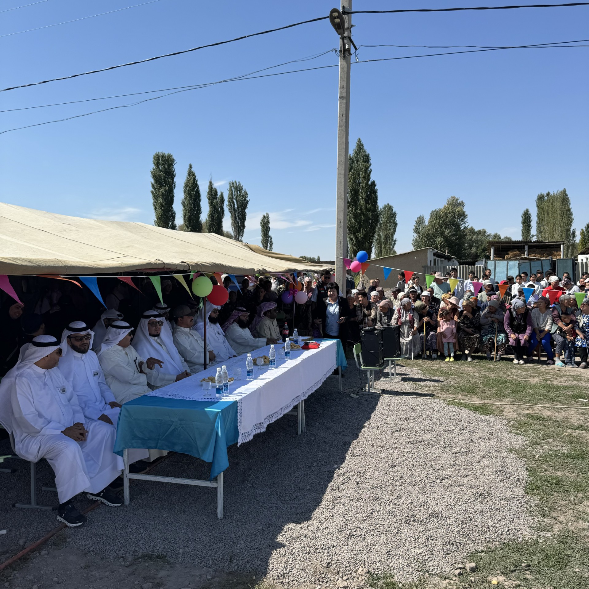 Al-Safa Charity and Humanitarian Society's officials during the opening of the water network