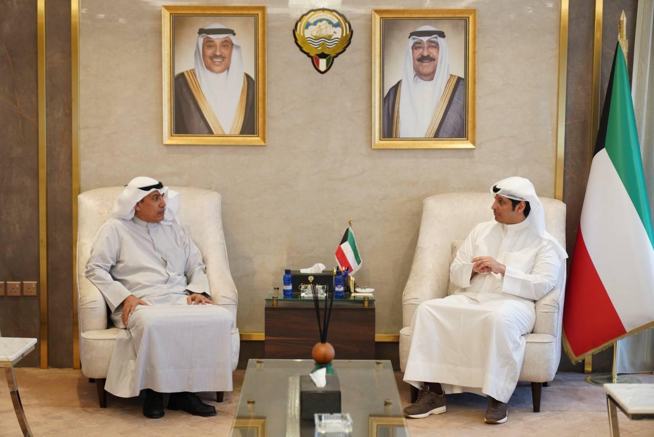 Minister of Information  Abdulrahman Al-Mutairi during his meeting with Kuwait Airways chairman Abdulmohsen Al-Fagaan 	
