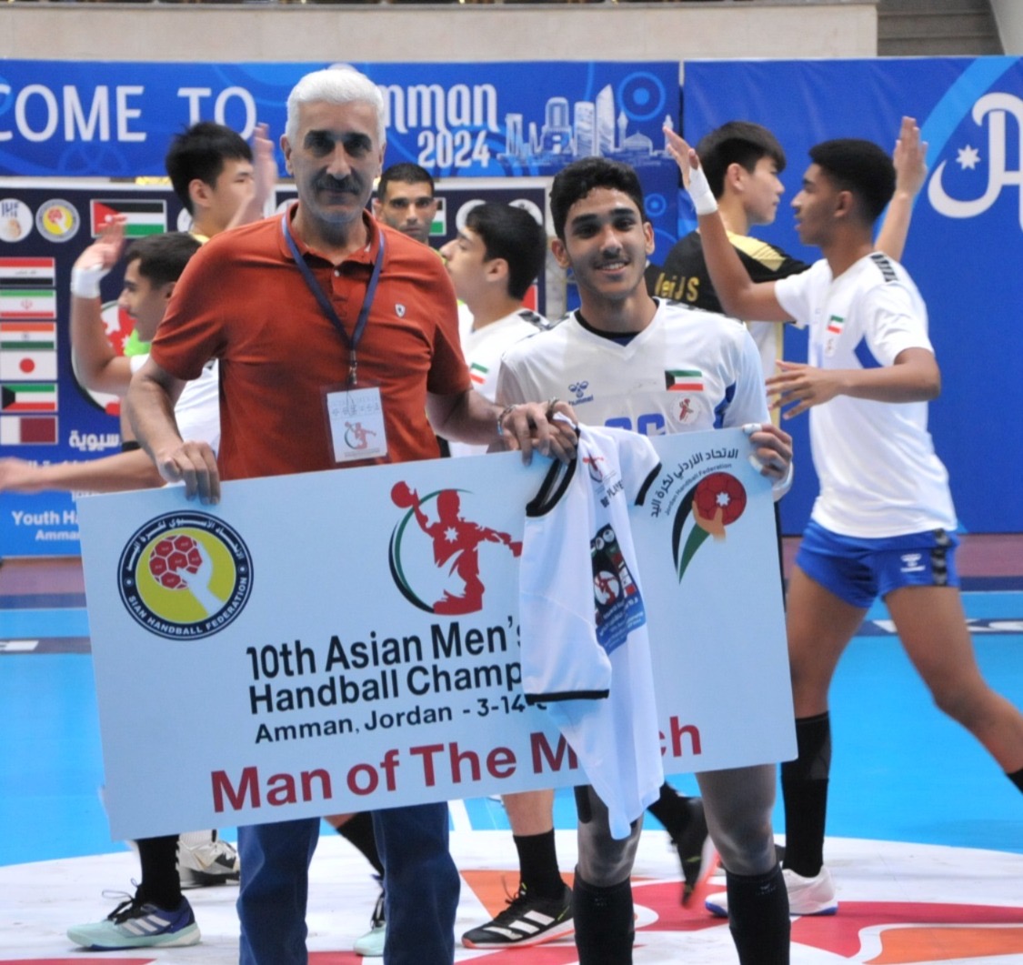 National team player Abdul Latif Salmeen receives the best player of the match award