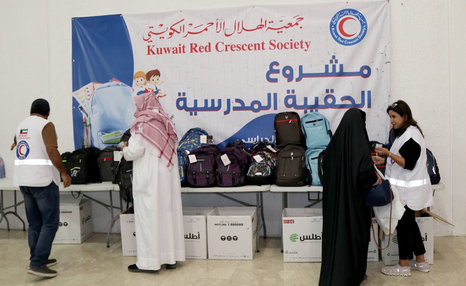 Kuwait Red Crescent Society distributes school bags to children of families in need
