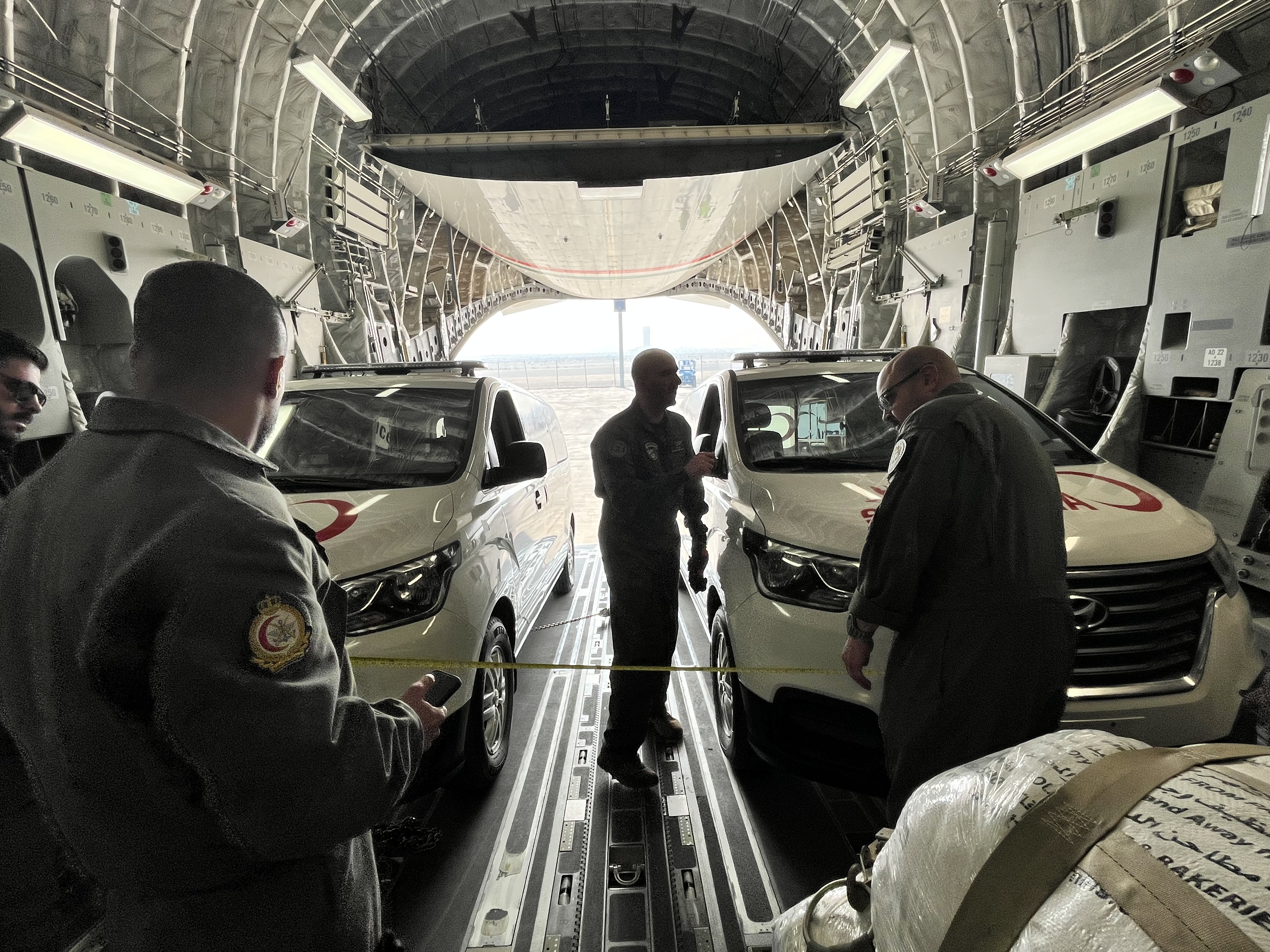 Two ambulances among the aid provided on the third relief plane
