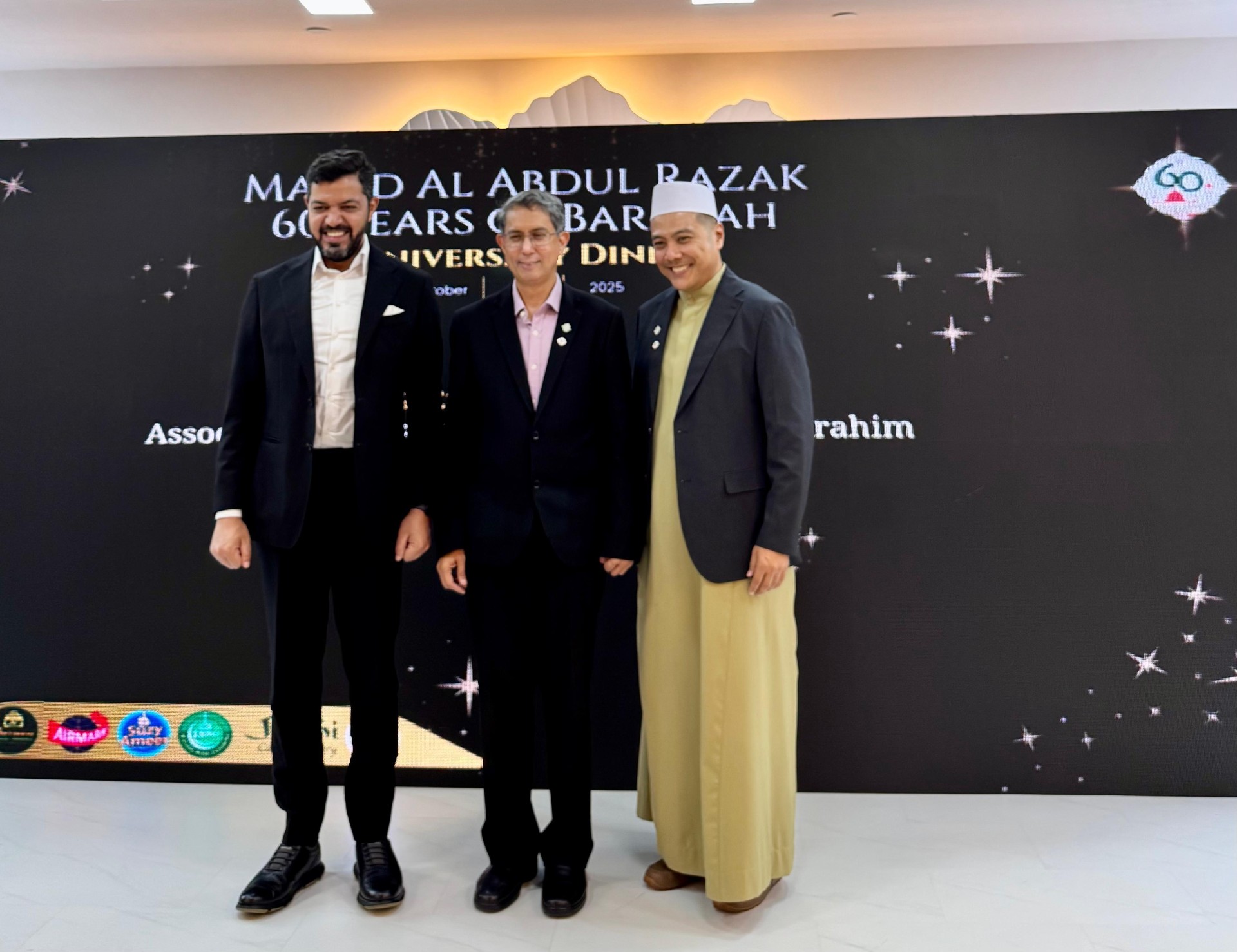 Kuwaiti Ambassador Ahmad Al-Shuraim, Singaporean Acting Minister-in-Charge of Muslim affairs Muhammad Ibrahim