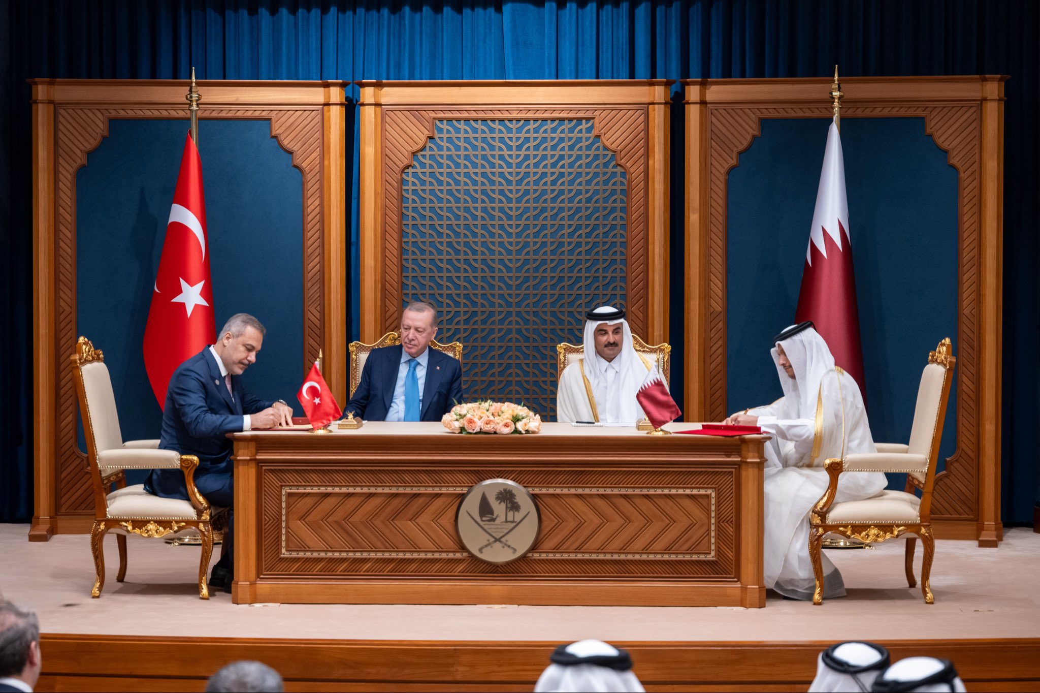 Qatar's Amir Sheikh Tamim bin Hamad Al-Thani and visiting Turkish President Recep Tayyip Erdogan