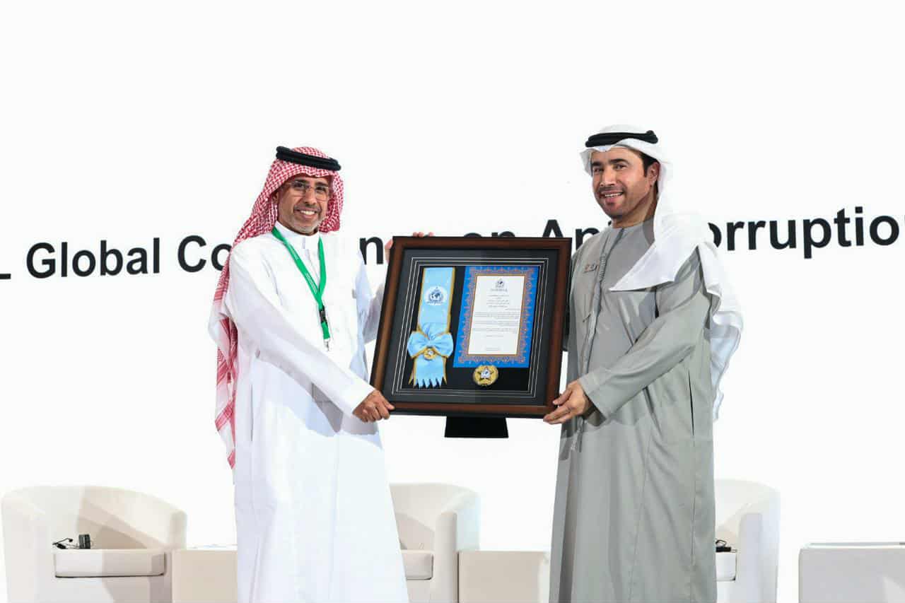 The Interpol honors Arab council chief Koman with top badge