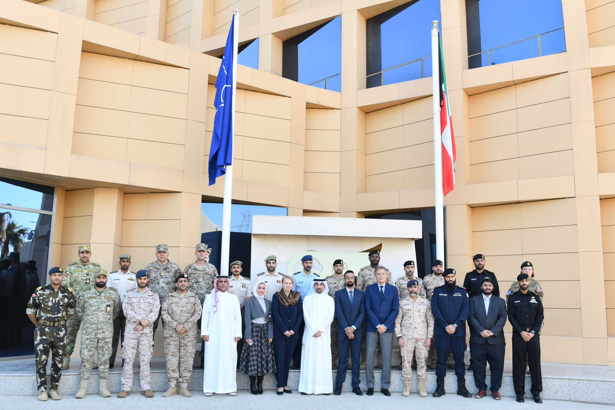 A group photo of the participants of the training course with NATO officials