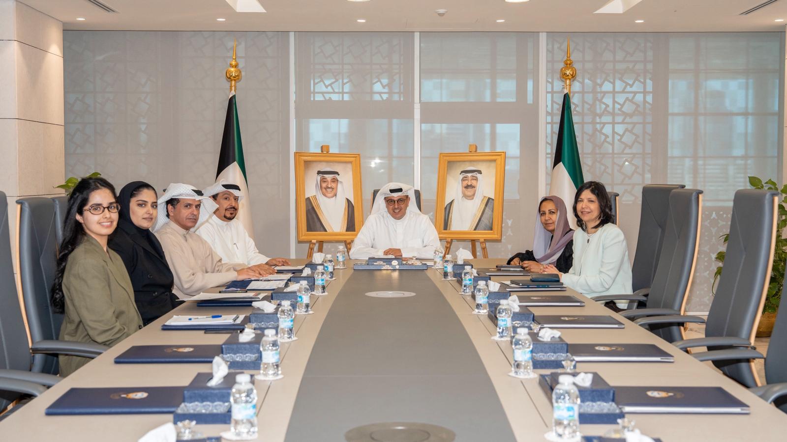 Acting Minister of Finance and Minister of State for Economic Affairs and Investment Dr. Subaih Abdulaziz Al-Mukhaizeem with Safaa El-Tayeb El-Kogali