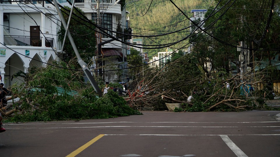 A scene in a street in Vietnam after Typhoon Kalmaegi swept through, reflecting the extent of the destruction left by the typhoon