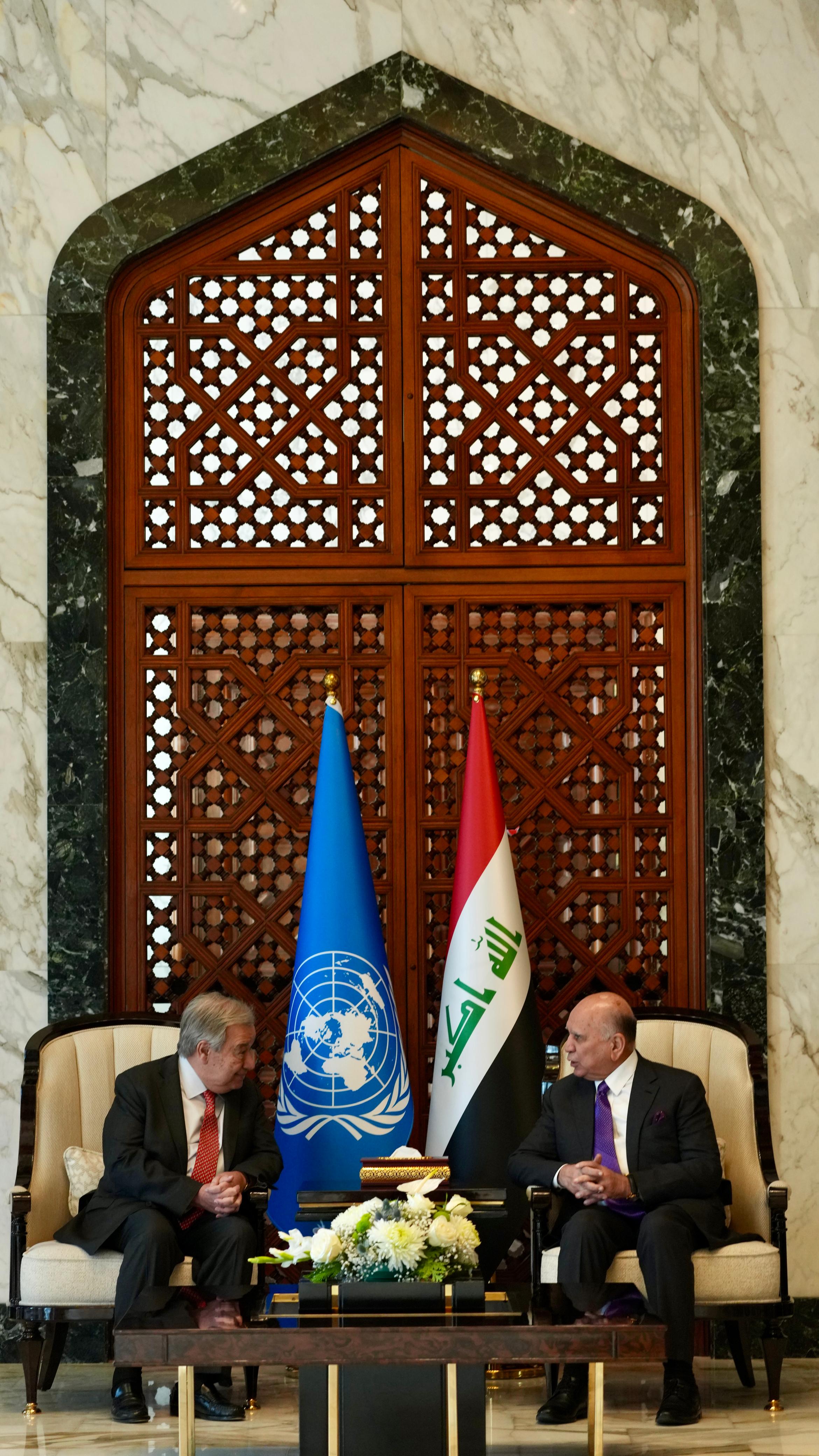 Foreign Minister Fuad Hussein with United Nations Secretary General Antonio Guterres
