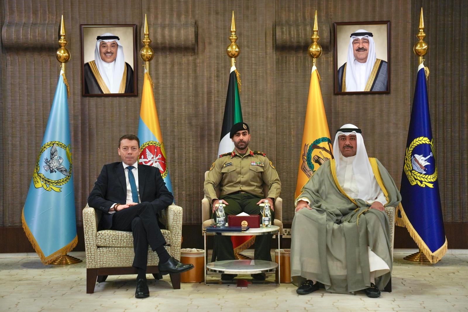 Kuwait Defense Minister with Trade Envoy of the United Kingdom to the State of Kuwait Lord Iain McNicol