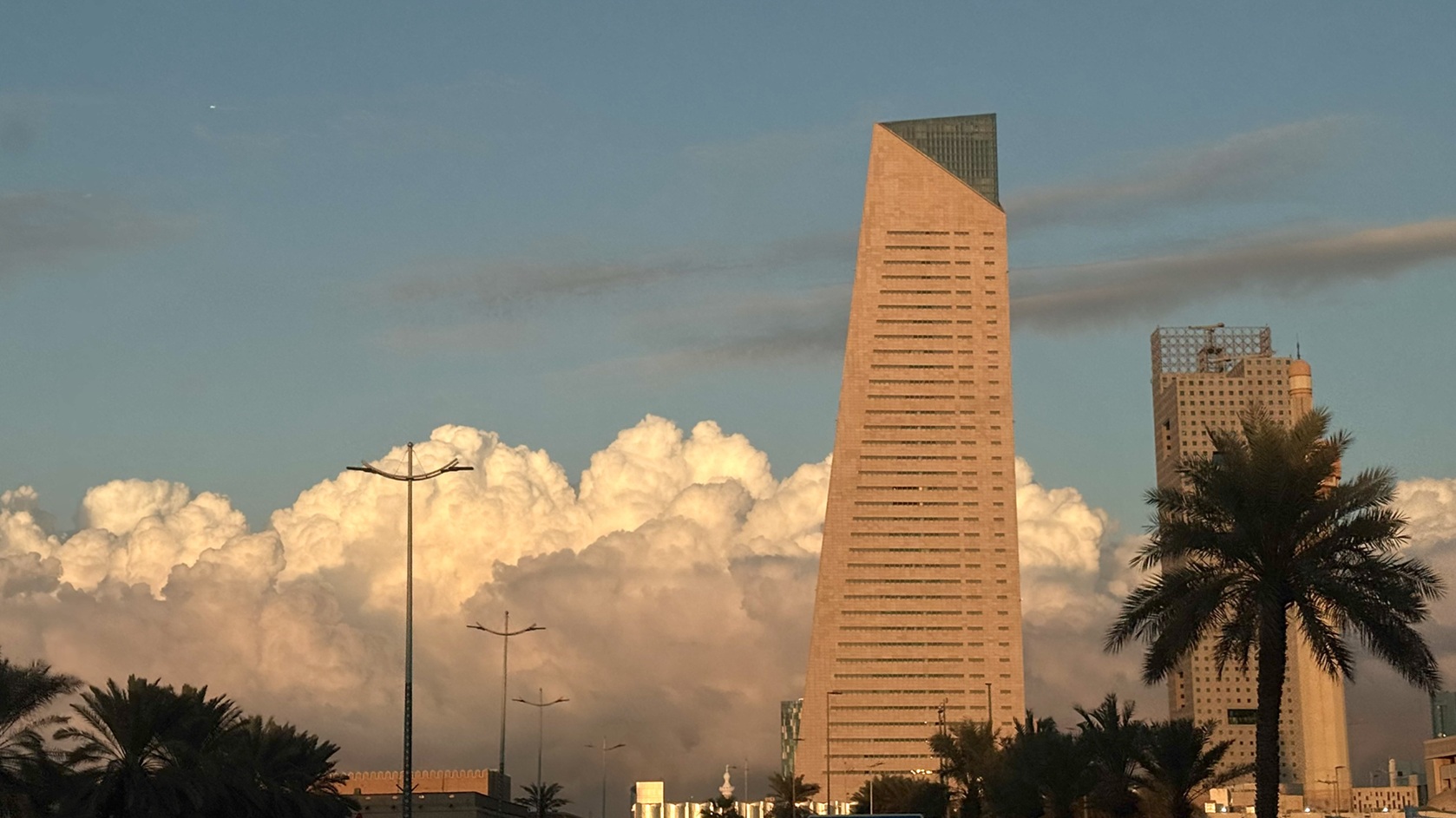 Clouds makes Kuwait sky vibrant portrait