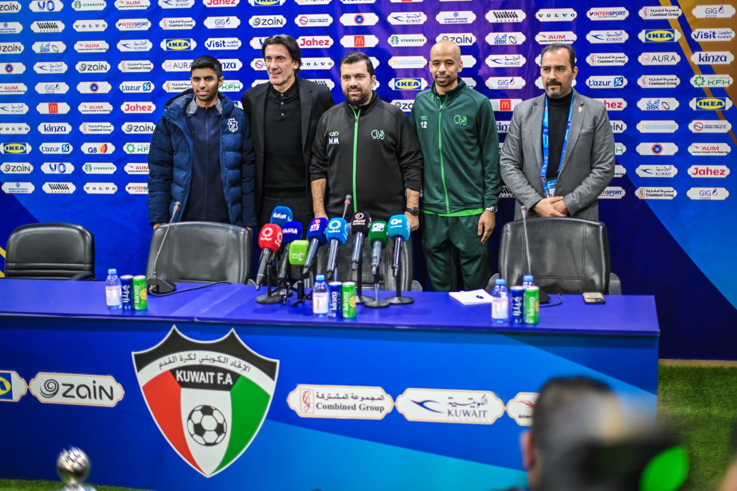 Coaches and players of Al-Arabi and Kuwait after a news conference
