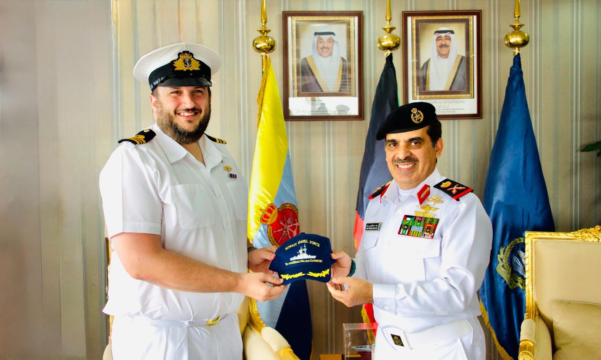 Commander of Kuwait Naval Forces Rear Admiral Saif Al-Hamlan with Commander at the Royal Navy's Minehunter HMS Middleton Lieutenant Colonel Kyle O'Regan.
