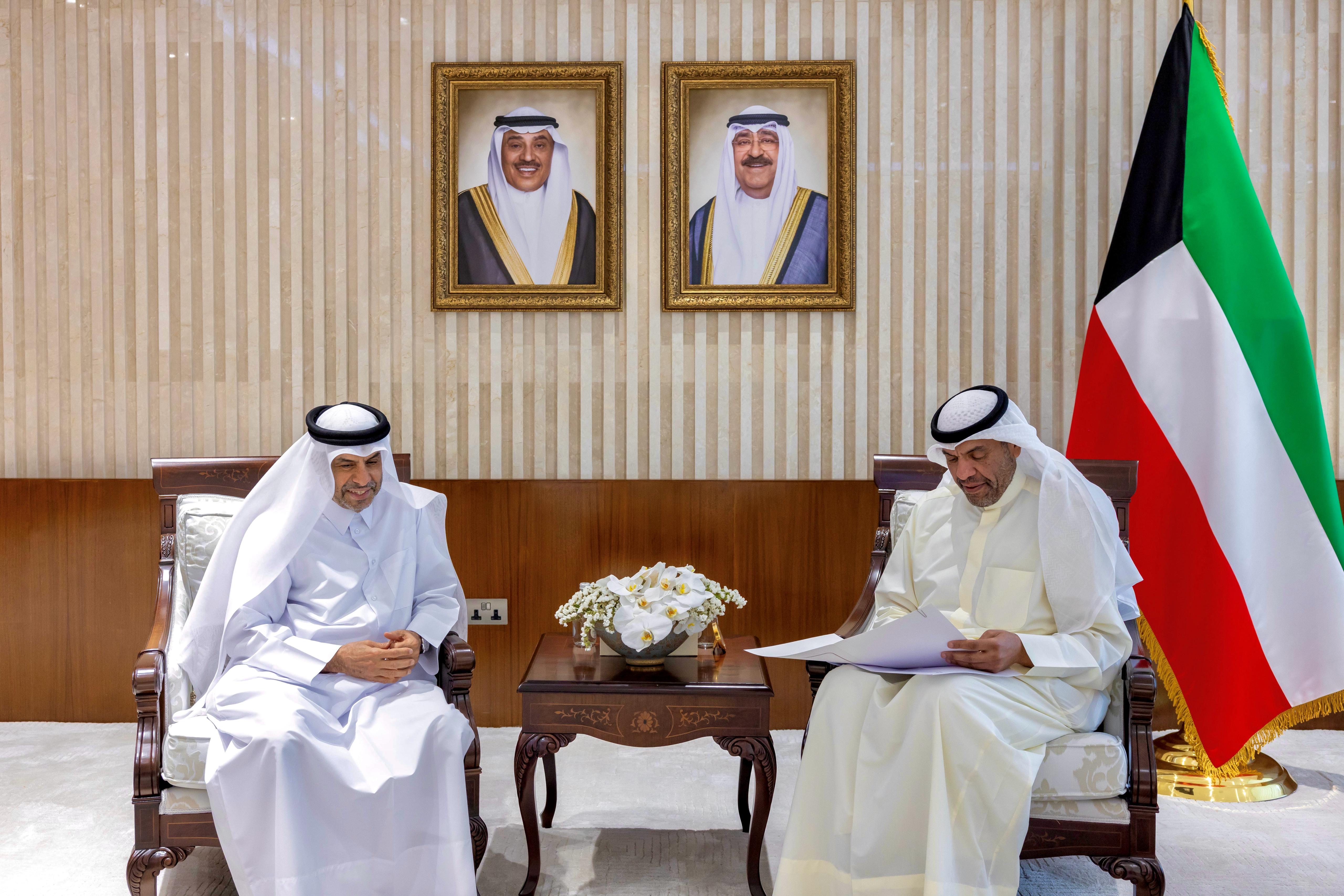 Minister of Foreign Affairs Abdullah Al-Yahya with Qatari Ambassador to Kuwait Ali Al-Mahmoud