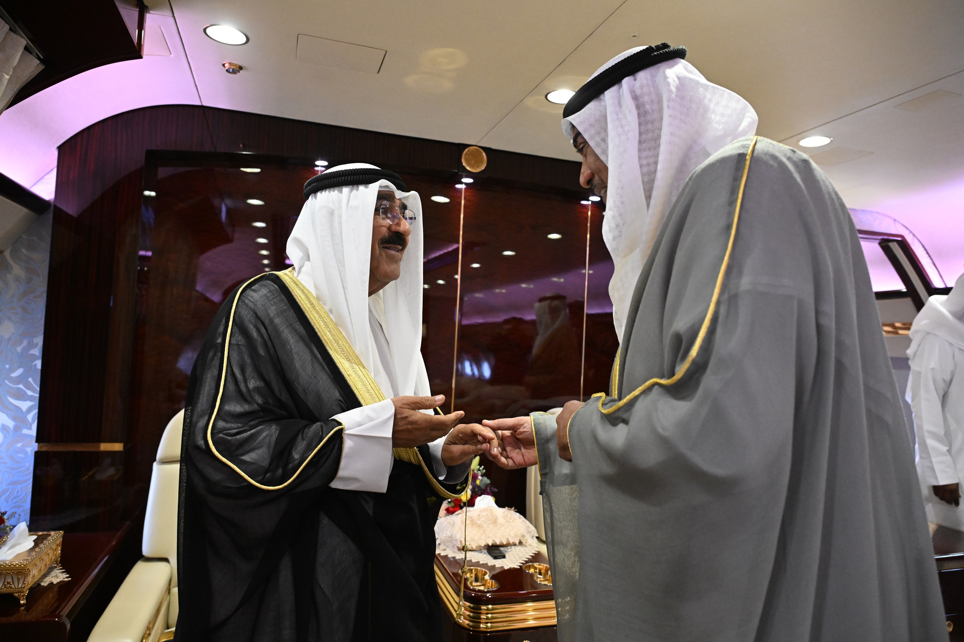 His Highness the Amir Sheikh Meshal Al-Ahmad Al-Jaber Al-Sabah seen off at the International Airport by His Highness the Deputy Amir and Crown Prince Sheikh Sabah Khaled Al-Hamad Al-Sabah