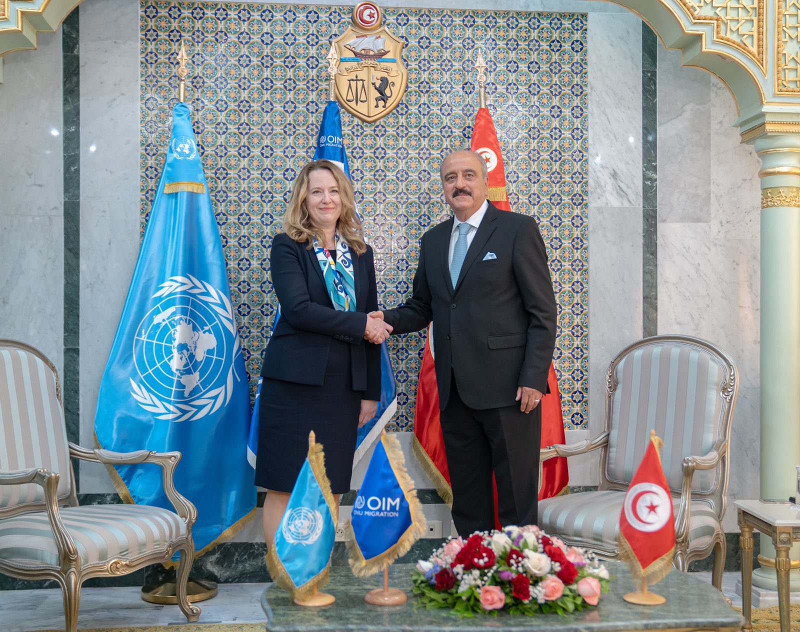 Foreign Minister Mohammed Al-Nafti with UN'S visiting migration agency chief Amy Pope