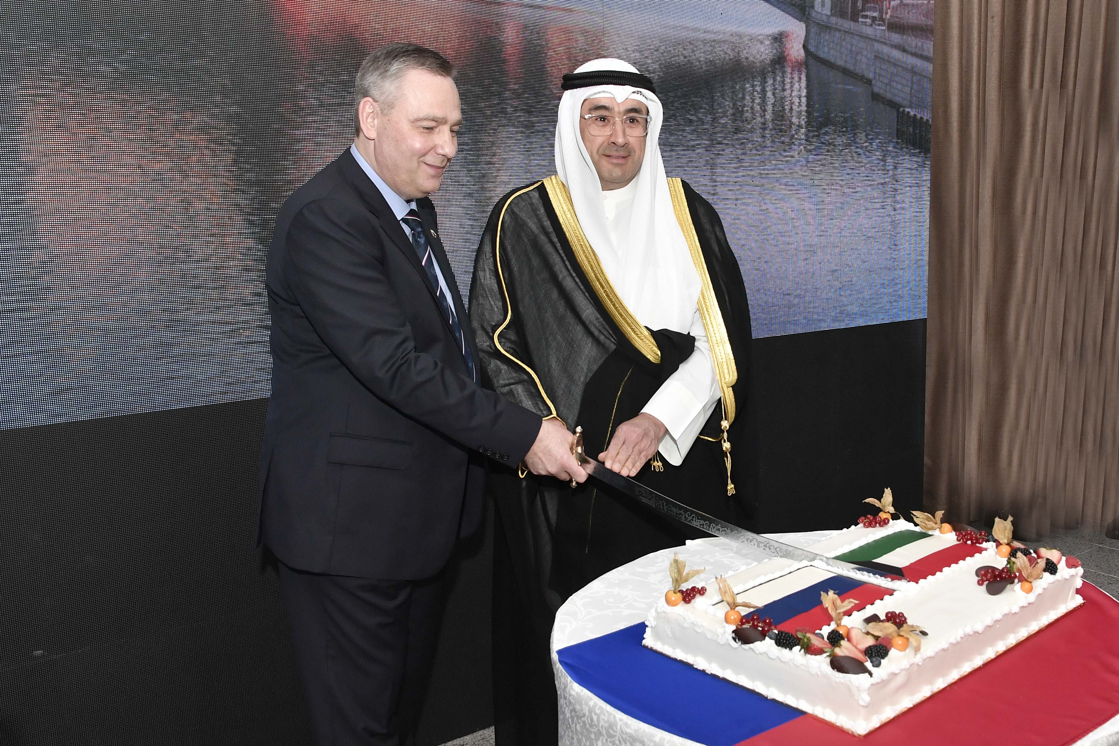 Kuwait's Assistant Foreign Minister for Europe Affairs Sadiq Marafi and Russia Ambassador to Kuwait Vladimir Zheltov during the celebration