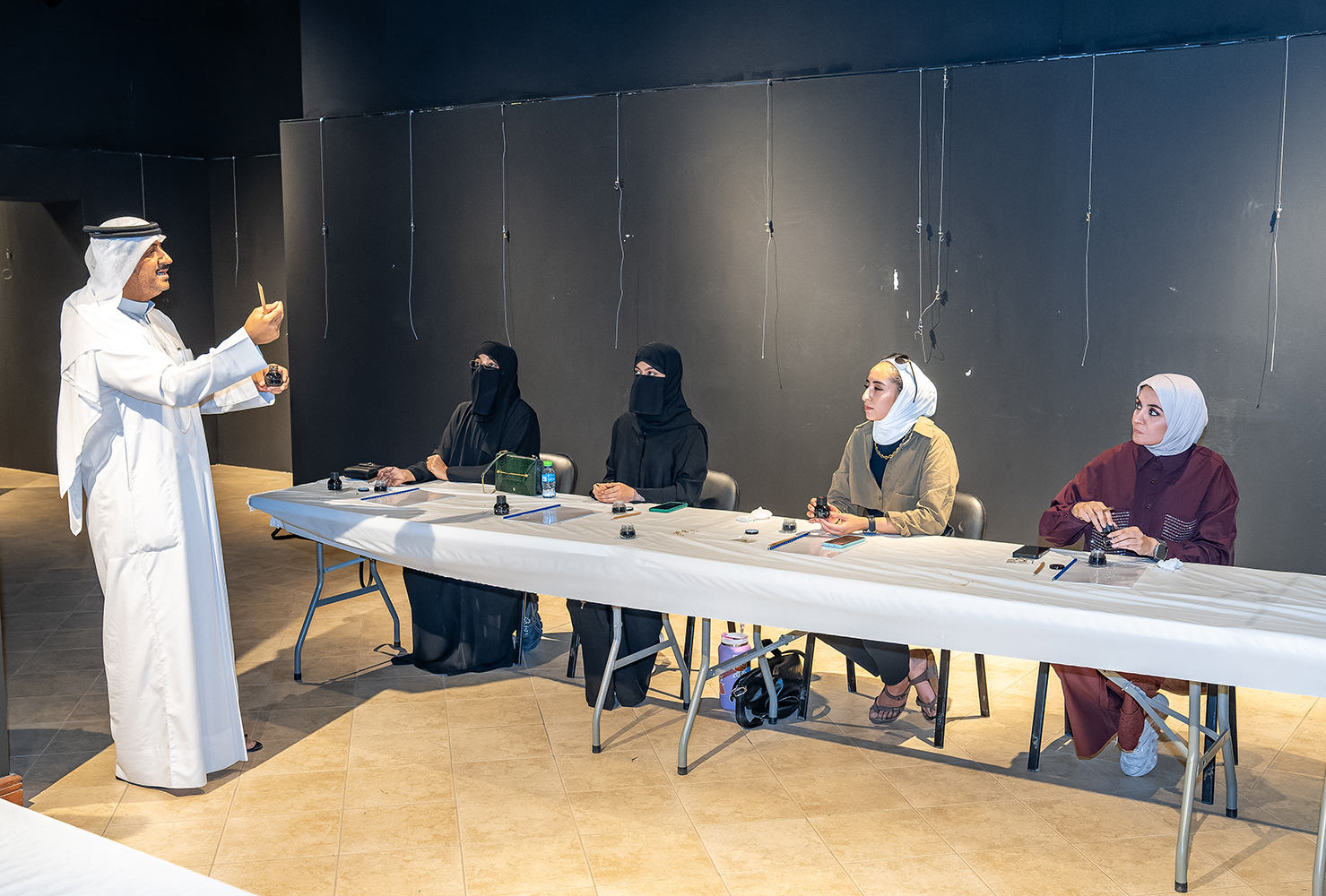 calligrapher Humoud Al-Jafran offered basics of Arabic calligraphy