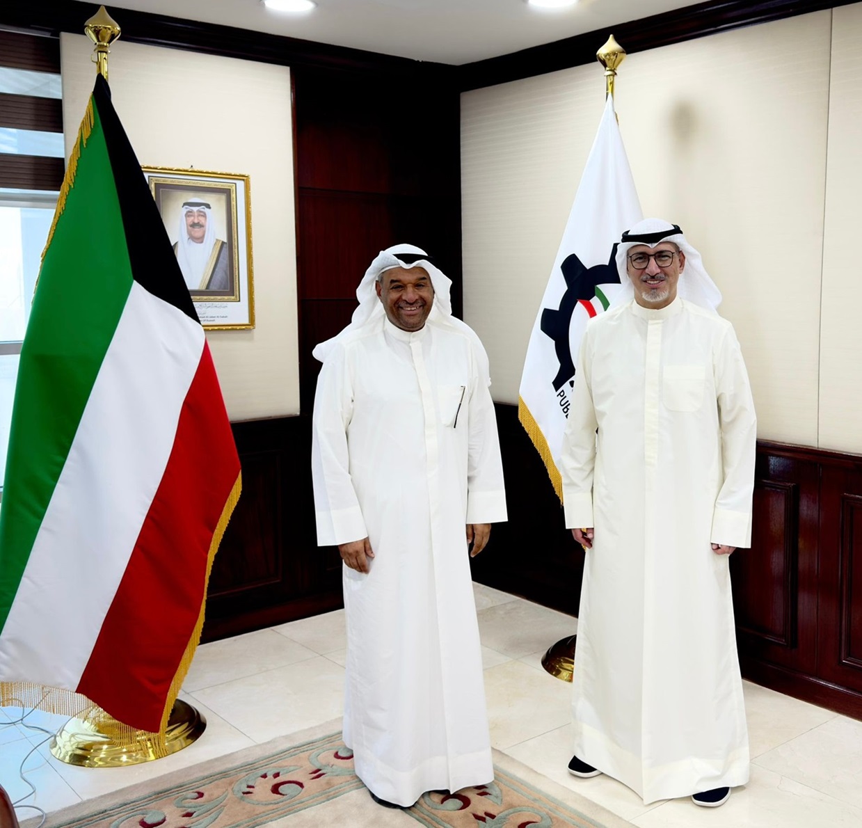 Minister of Commerce and Industry Khalifa Al-Ajeel and Kuwait Flour Mills and Bakeries Company (KFMB) CEO Mutlaq Al-Zayed