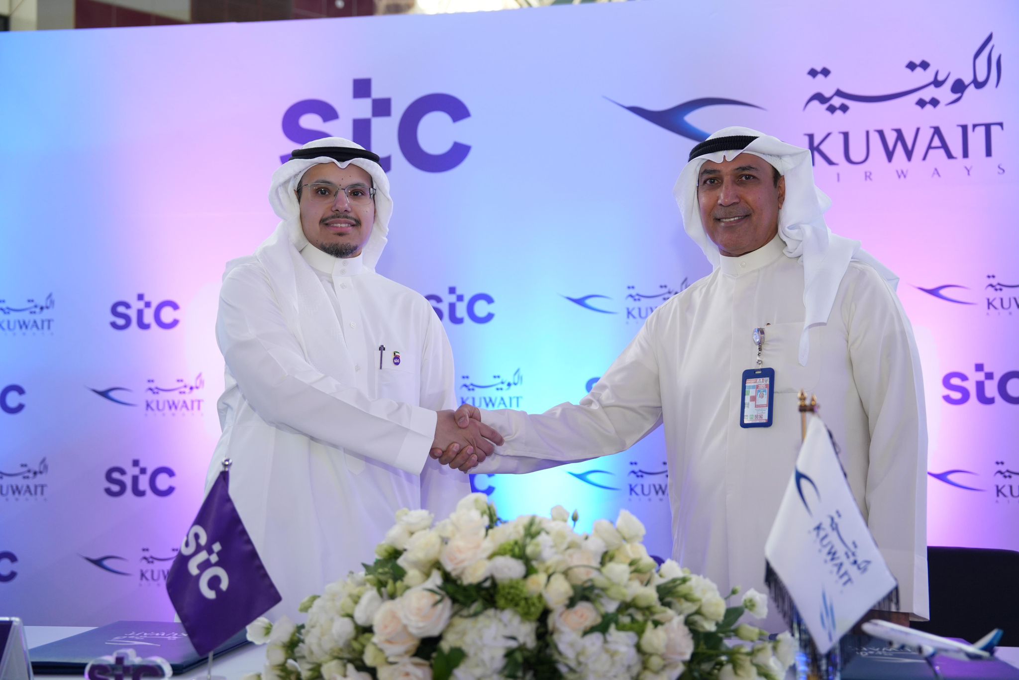 Kuwait Airways Chairman Abdulmohsen Al-Fagaan and STC's Executive Chairman Moataz Al-Dharrab